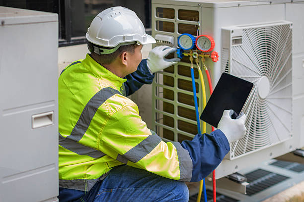 Professional Heat Pump Repair technician working in Franklin Park, NJ